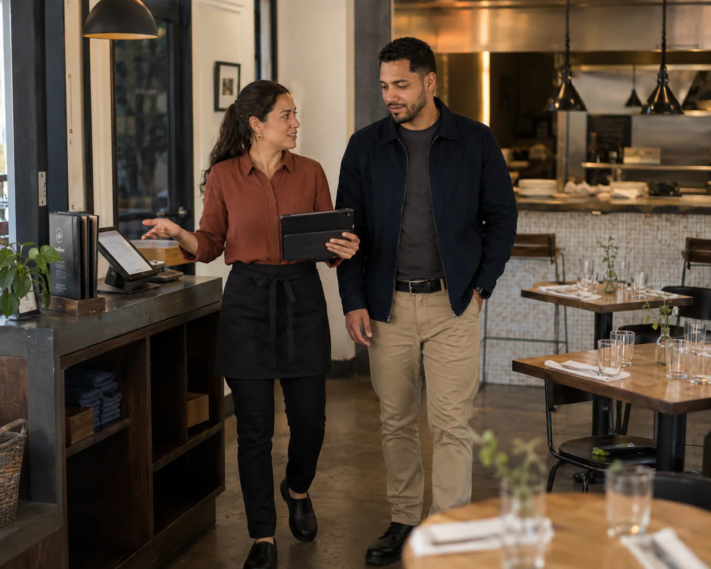 Dale Works reviewing customer and service operations with a restaurant owner